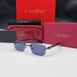 نظارات شمسية كارتييه رمادي داكن/فضي بدون إطار مستطيلة الشكل وعدسات كحلي/أزرق داكن Cartier Dark Silver Rimless Rectangular Navy Blue Sunglasses