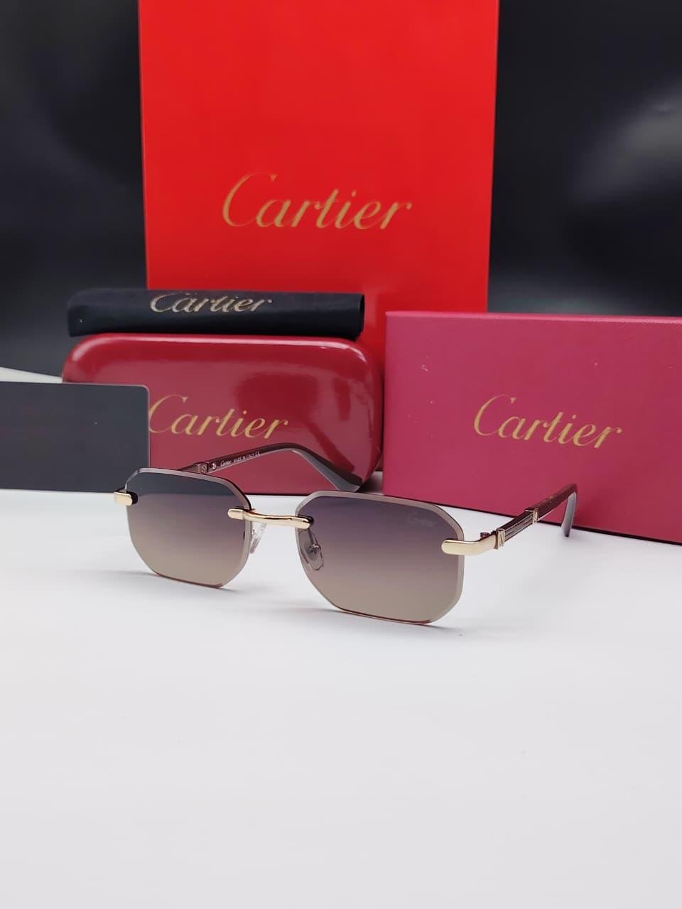 نظارات شمسية كارتييه ذهبية بدون إطار مستطيلة الشكل مع أذرع خشبية وعدسات بنية متدرجة Cartier Gold Rimless Rectangular Wooden Gradient Sunglasses