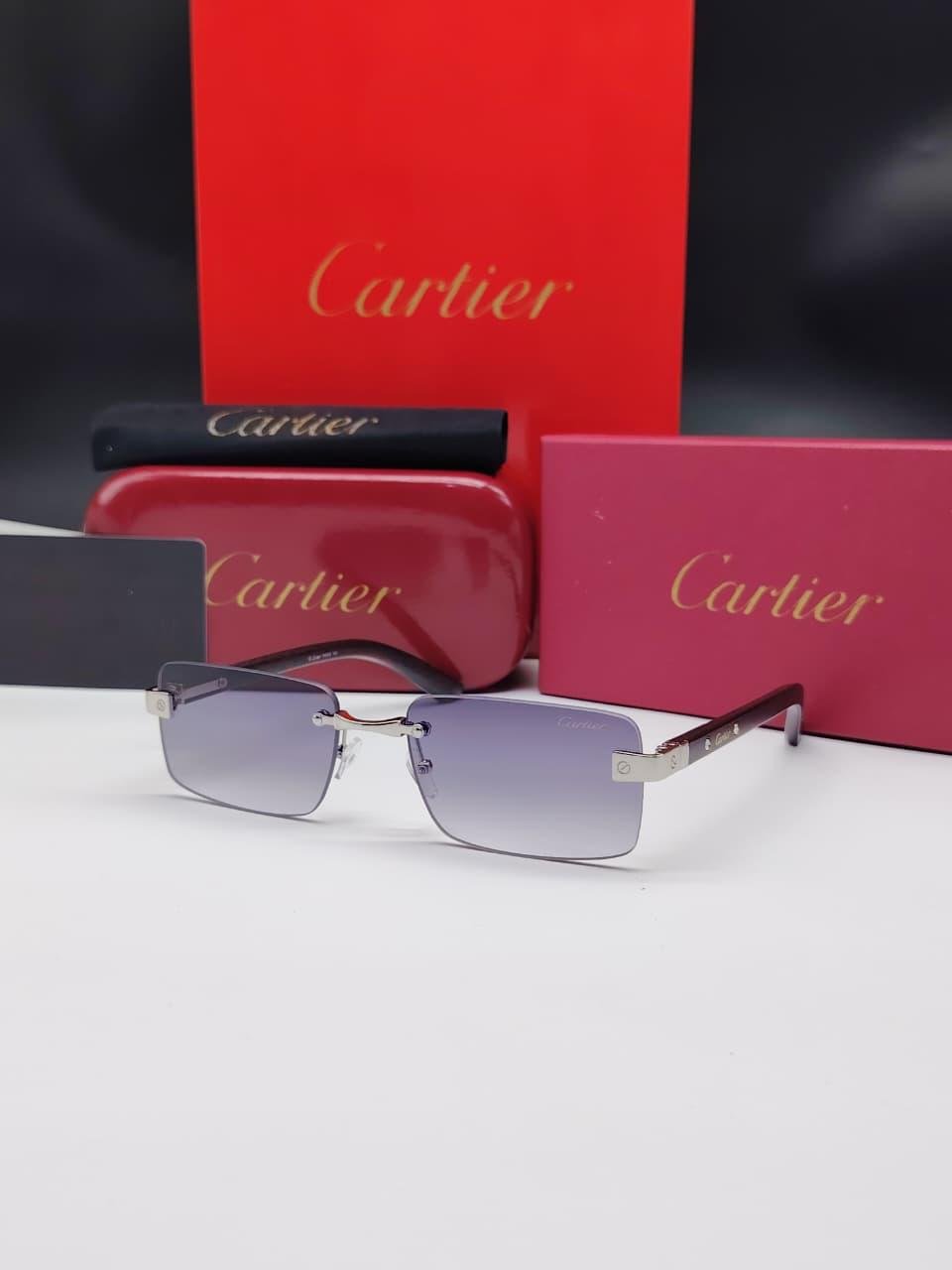 نظارات شمسية كارتييه فضية بدون إطار مستطيلة الشكل وعدسات رمادي/بنفسجي متدرج Cartier Silver Rimless Rectangular Purple Gradient Sunglasses