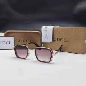 نظارات شمسية غوتشي ذهبية وبنية بإطار هندسي مستطيل وعدسات بنية متدرجة Gucci Gold & Brown Rectangular Gradient Sunglasses